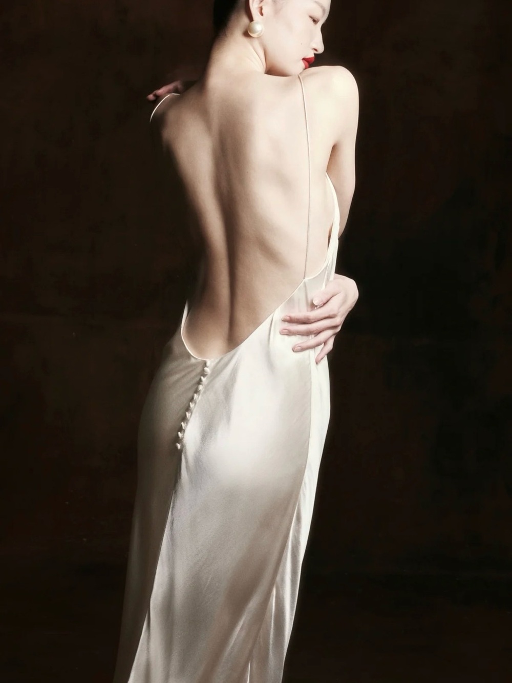 Elegant Ivory Backless Slip Dress with Button Detail - Picture 3 of 10